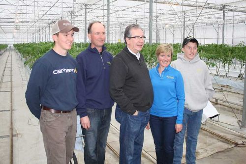 Greg and Allison Shannon with sons and Minister Leal at Sun Harvest Greenhouse